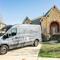 Boost Air And Plumbing service van at a customer home in Arlington, TX