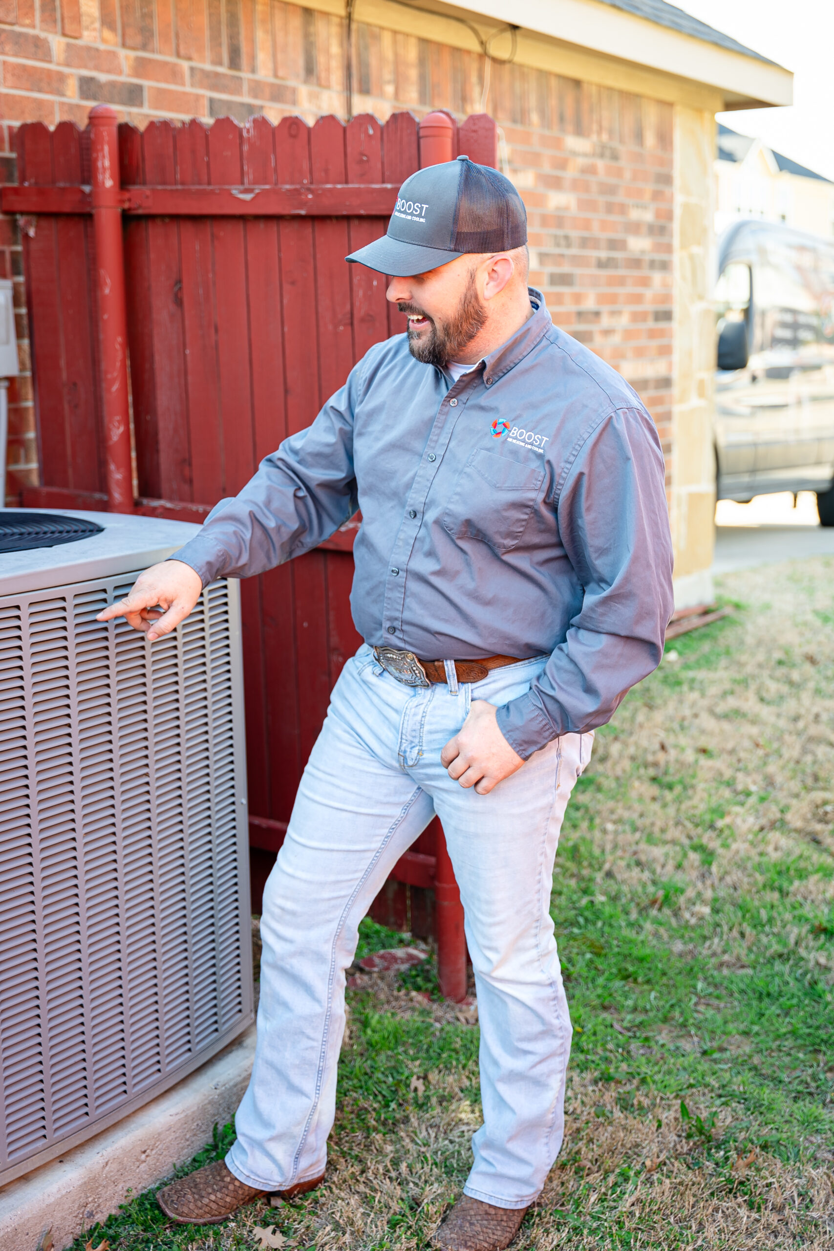 Boost Air technician completing an HVAC service call
