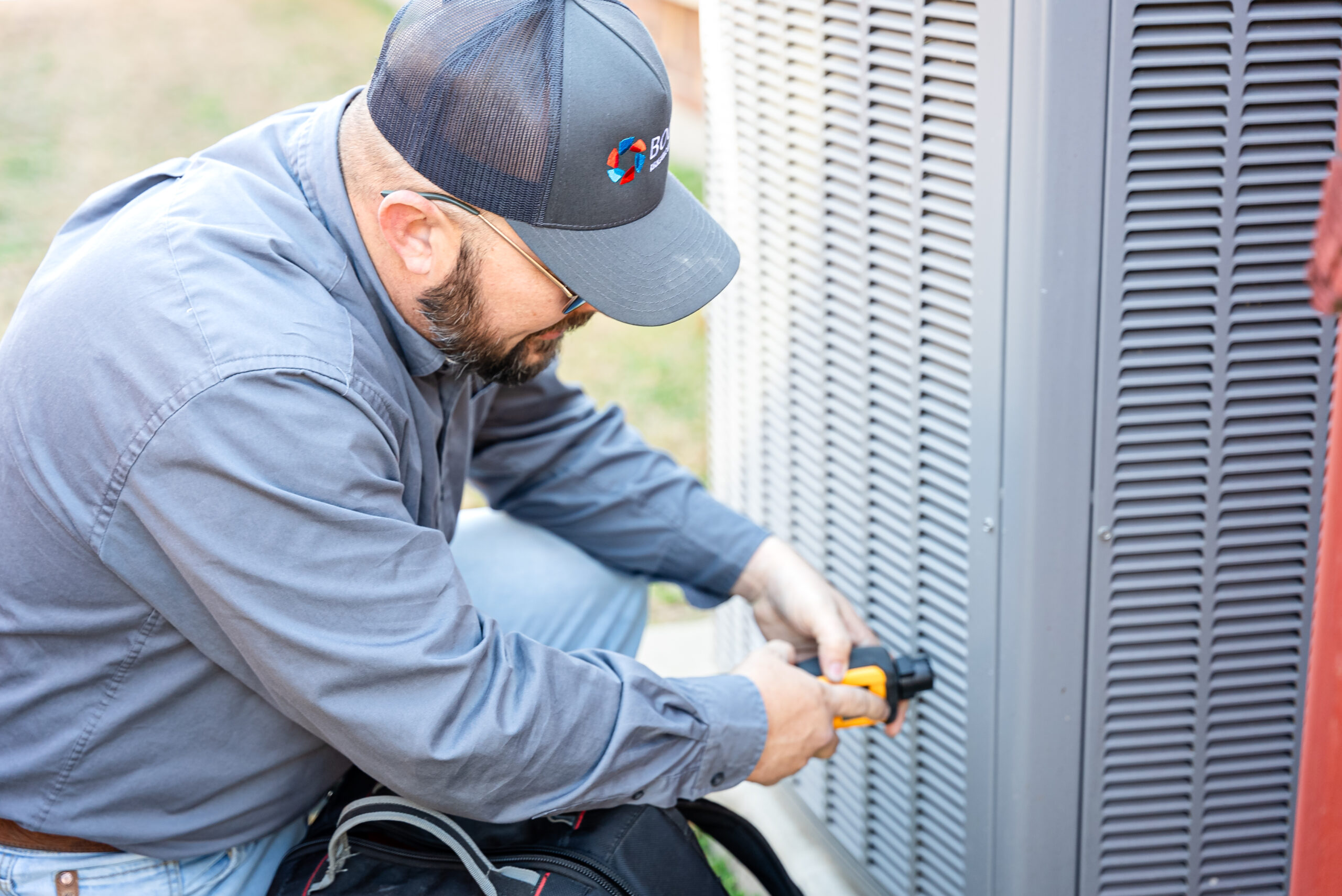 Boost Air technician servicing equipment in the DFW Metroplex